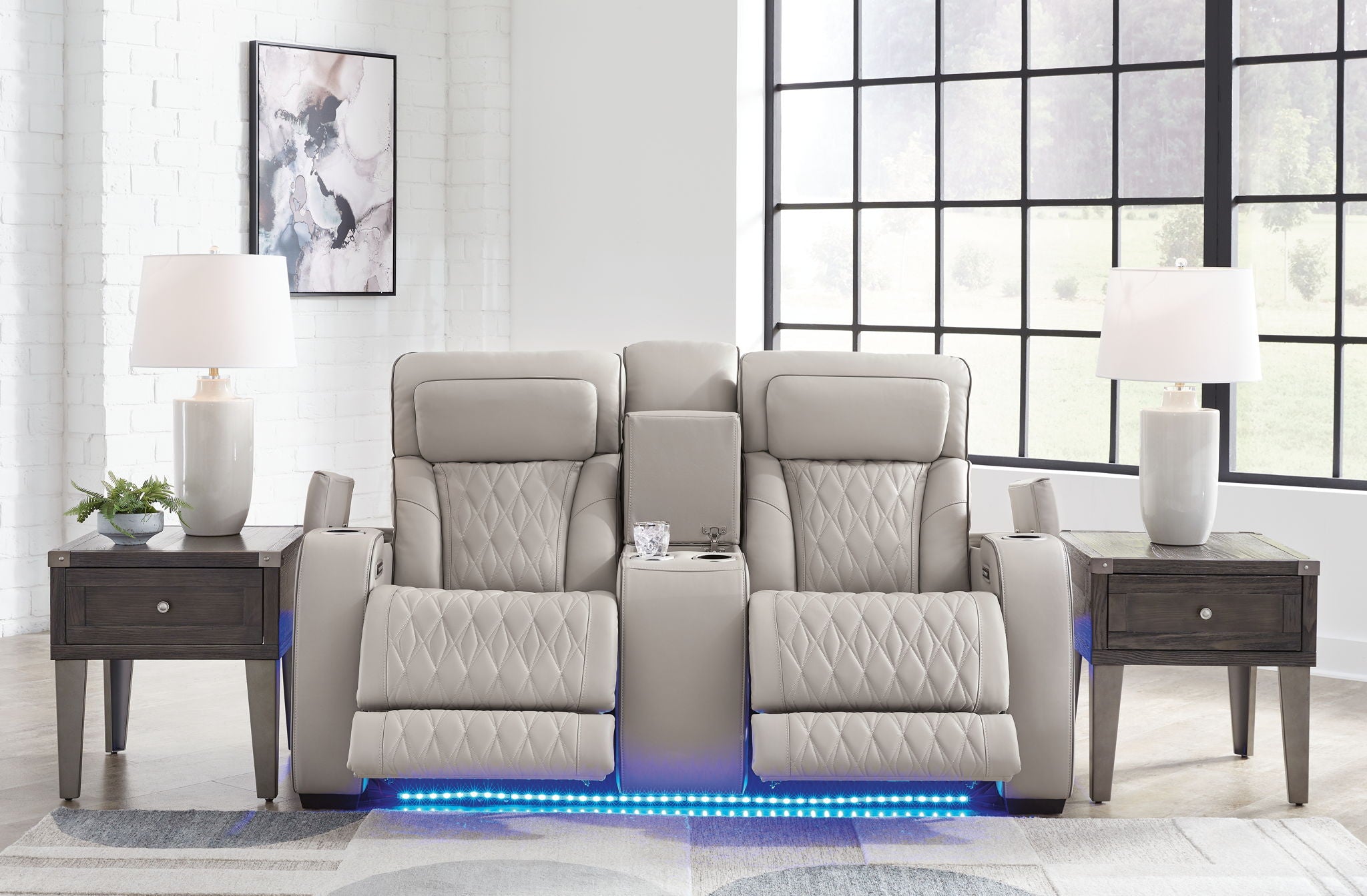 Boyington - Power Reclining Loveseat with Console/Adj Hdrst - Gray